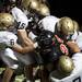 The Chelsea defense tackles Tecumseh ball carrier Spencer Hite in the first half on Friday. Daniel Brenner I AnnArbor.com